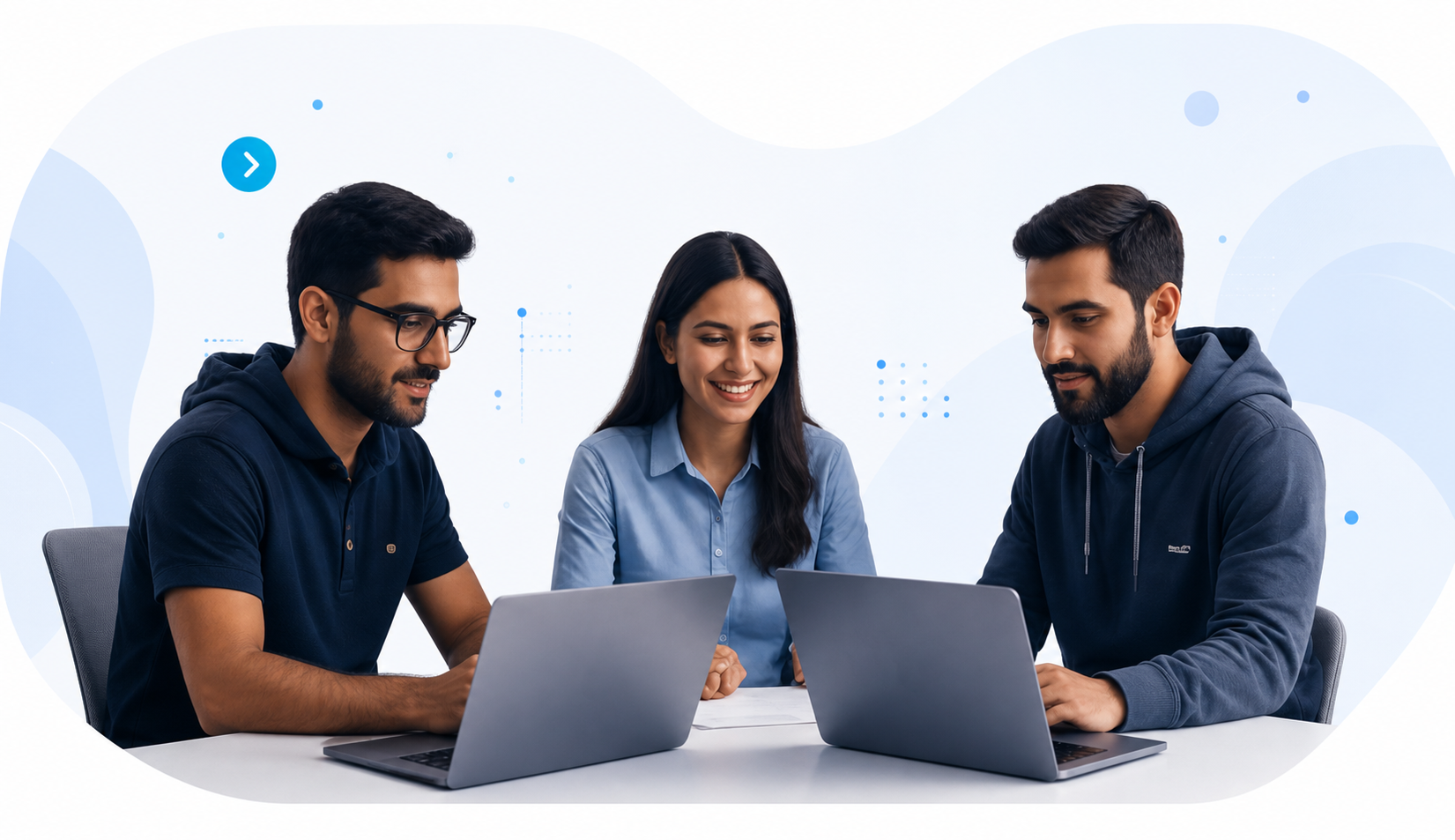 Three software developers collaborating with laptops